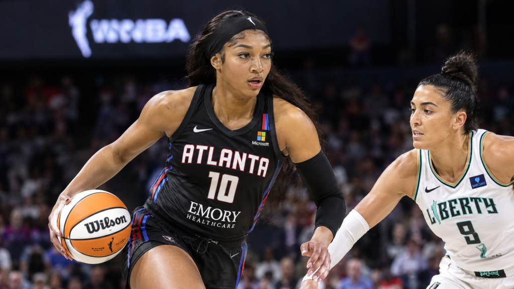 Angel Reese of the Atlanta Dream drives to the basket during the 2026 WNBA playoffs.
